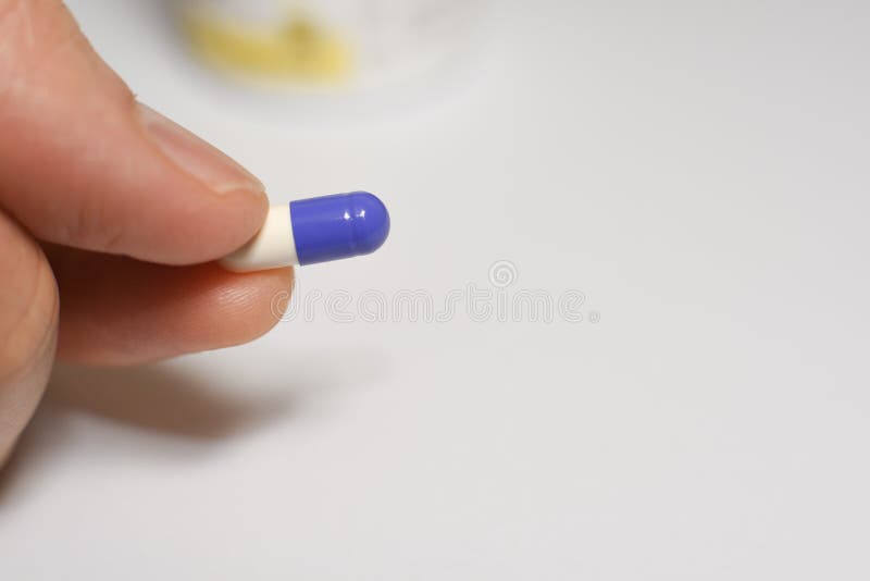 Medical pills and capsules stock images