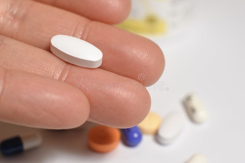 Medical pills and capsules stock photos