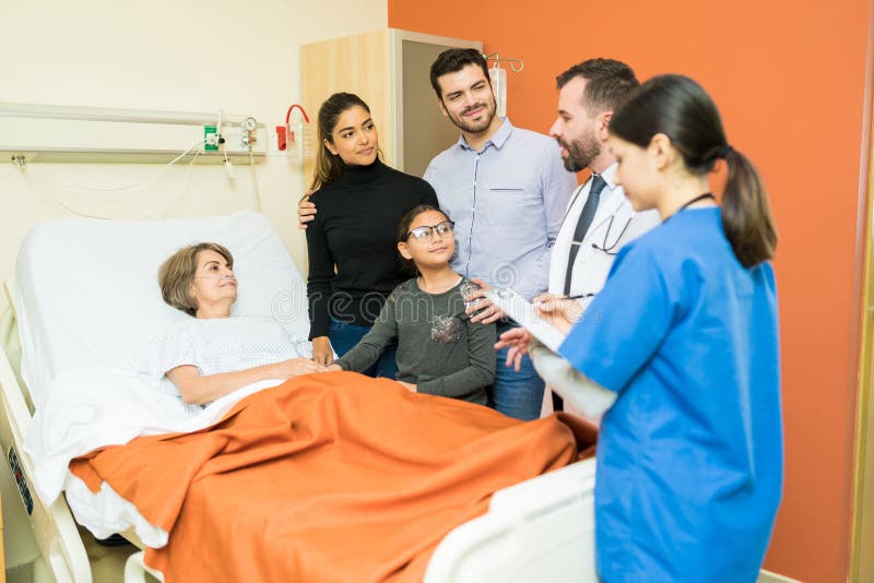 hospital room with patient and family