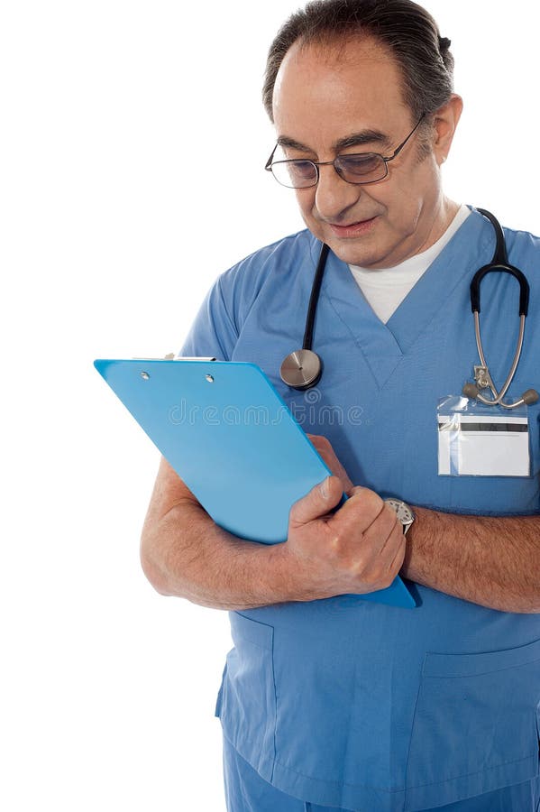 Medical Specialist Studying Report Stock Photo Image of positive, confident 24613722