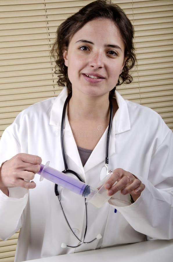Medical Staff Holding a Syringe and Sample Container Stock Image Image of hand, staff 28470771