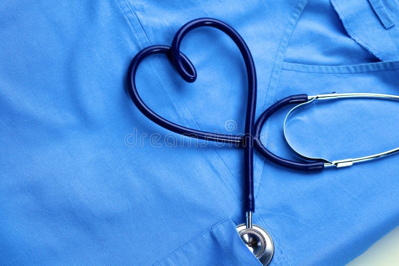 Medical Stethoscope Twisted In Heart Shape Lying On Patient Medical History  List And Blue Doctor Uniform Closeup Stock Photo, Picture and Royalty Free  Image. Image 80480566.