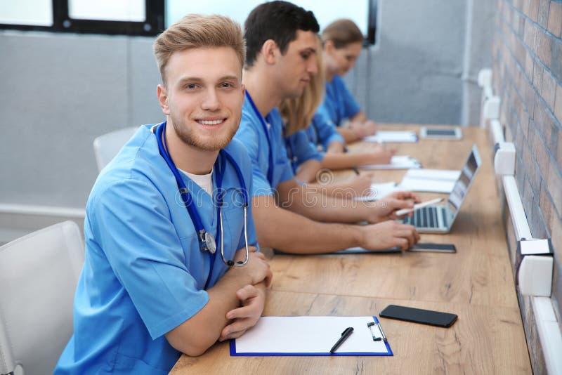 Medical Student with Groupmates Studying Stock Photo Image of