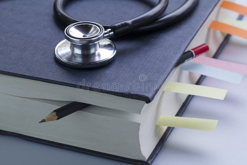 Medical Student Textbook and Pencil Stock Image Image of reading