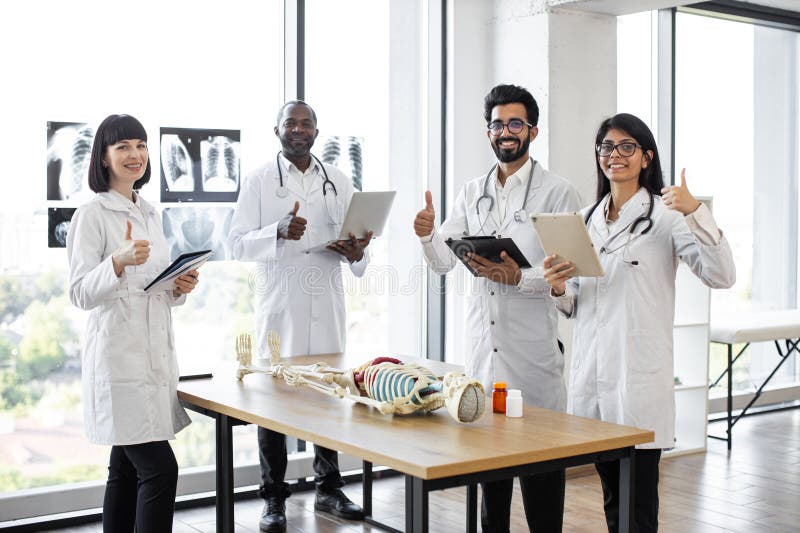 Medical Students on Anatomy Lesson in Classroom Showing, Thumbs Up ... Biology Diagrams