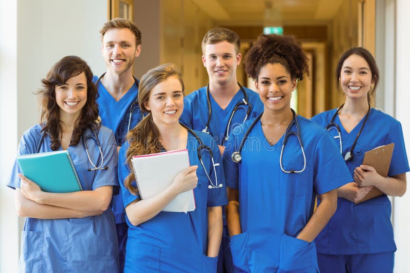 Medical students smiling at the camera royalty free stock images Medical students smiling at the camera royalty free stock images