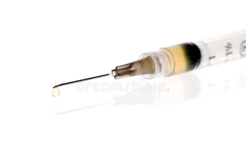 Medical Syringe With Drip Focus On Tip stock photo Medical Syringe With Drip Focus On Tip stock photo