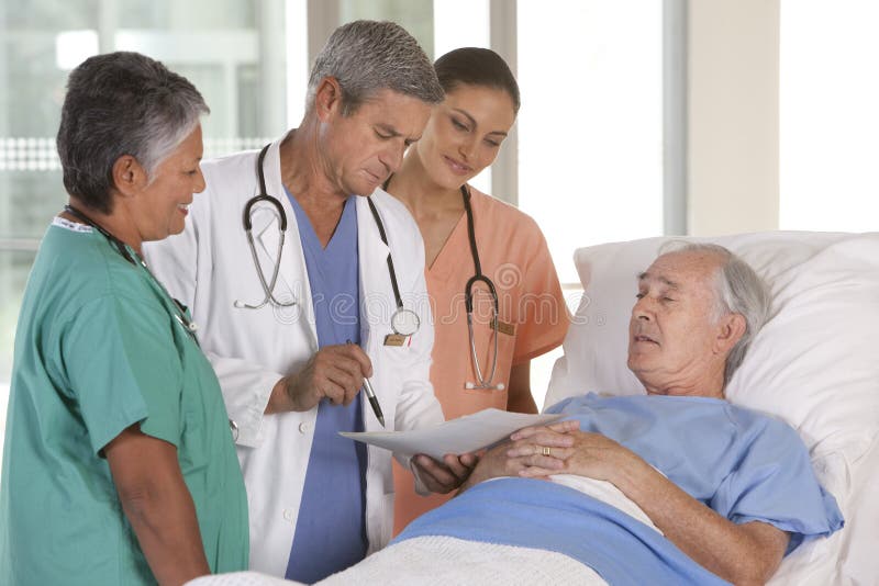 Medical team discussing results stock images