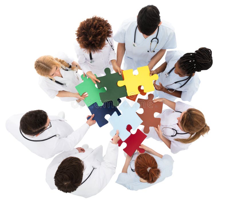 Medical Team Solving Jigsaw Puzzle Stock Photo Image of nurses