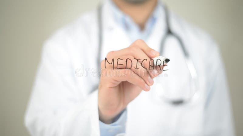 Medicare, Doktorschreiben auf transparentem Schirm stockfoto Medicare, Doktorschreiben auf transparentem Schirm stockfoto