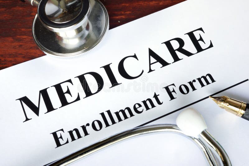 Medicare-Einschreibungsform geschrieben auf ein Papier stockfotografie Medicare-Einschreibungsform geschrieben auf ein Papier stockfotografie