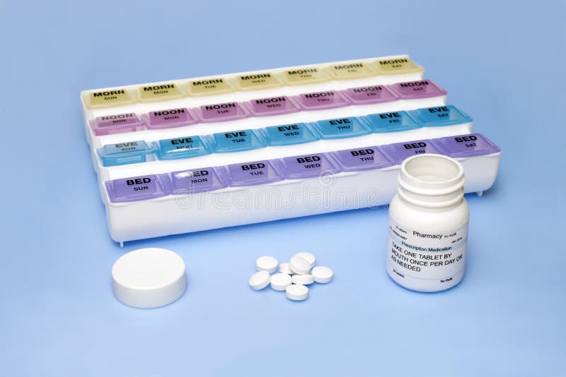 Medication Dispenser stock photo. Image of health, pillbox 40816618