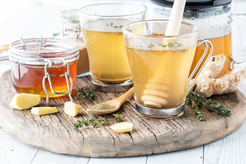 Medicinal Elixir Tea with Ingredients on a Rustic Wooden Board. Stock