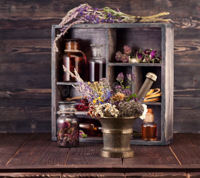 Medicinal herbs mortar and bottles tincture. stock photos Medicinal herbs mortar and bottles tincture. stock photos