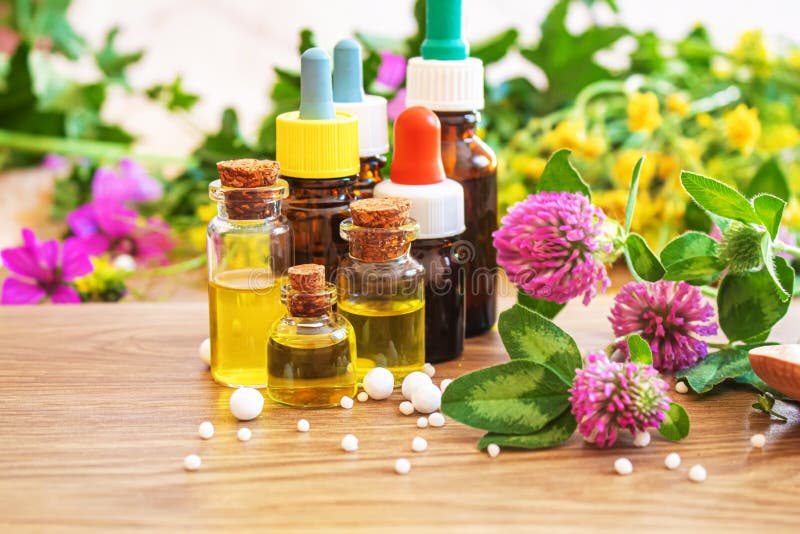 Medicinal Herbs, Oils in Small Bottles Homeopathy. Selective Focus