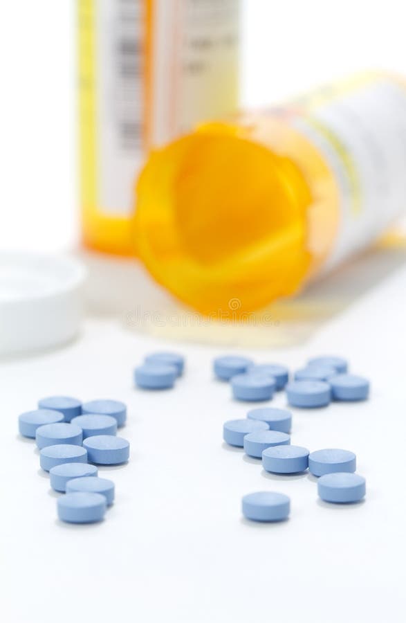 Medicine bottle spilled royalty free stock photography