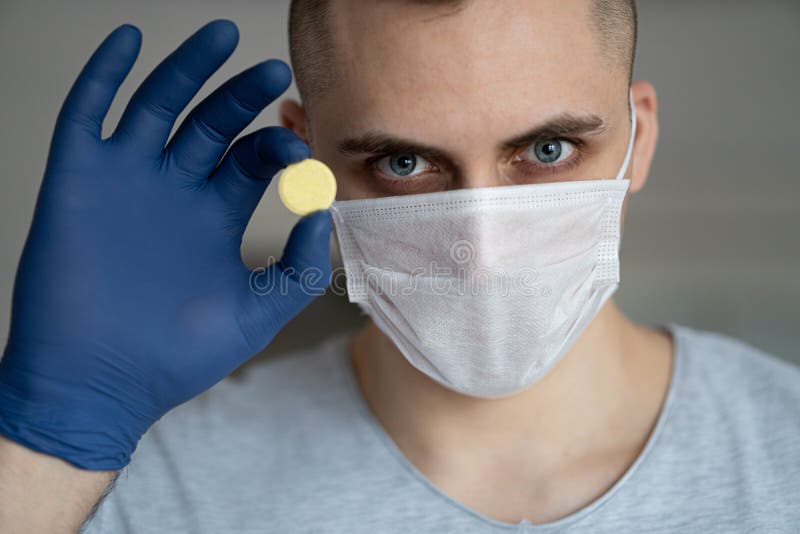 The medicine for coronavirus. The pill from the virus. Healthcare worker in the Coronavirus pandemic royalty free stock images