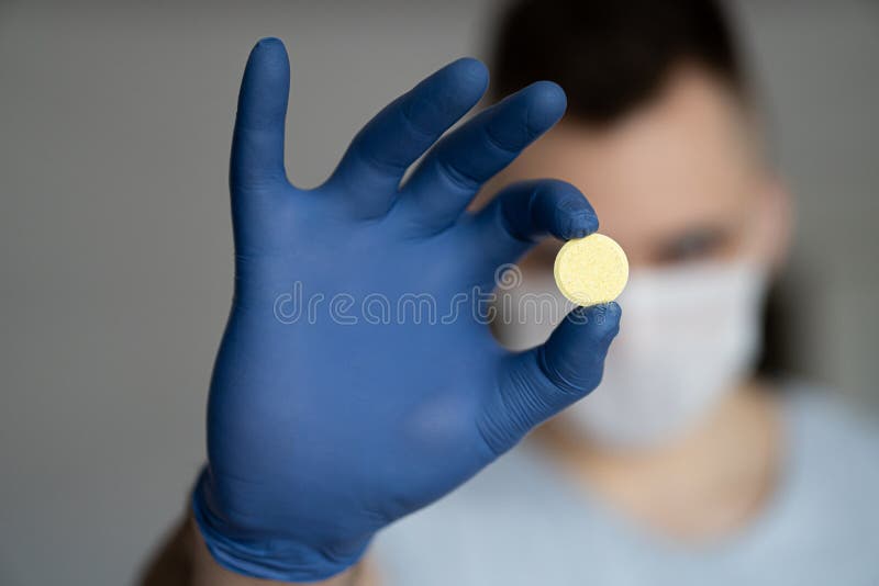 The medicine for coronavirus. The pill from the virus. Healthcare worker in the Coronavirus Covid19 pandemic stock images