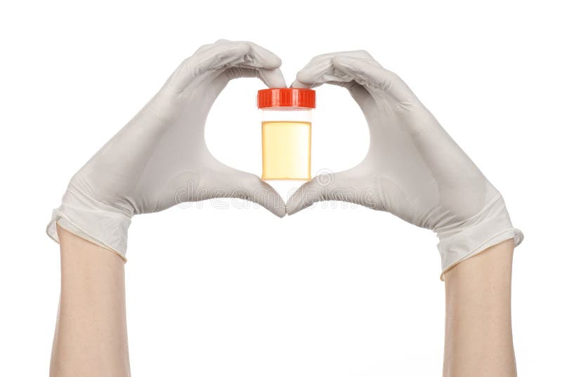 Medical theme: doctor's hand in white gloves holding a transparent container with the analysis of urine on a white background studio. Medical theme: doctor's hand in white gloves holding a transparent container with the analysis of urine on a white background studio