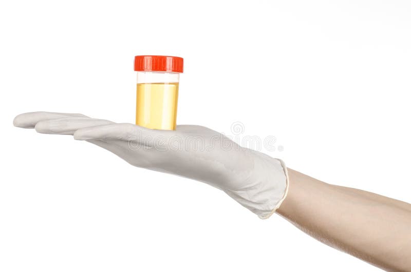 Medical theme: doctor's hand in white gloves holding a transparent container with the analysis of urine on a white background studio. Medical theme: doctor's hand in white gloves holding a transparent container with the analysis of urine on a white background studio