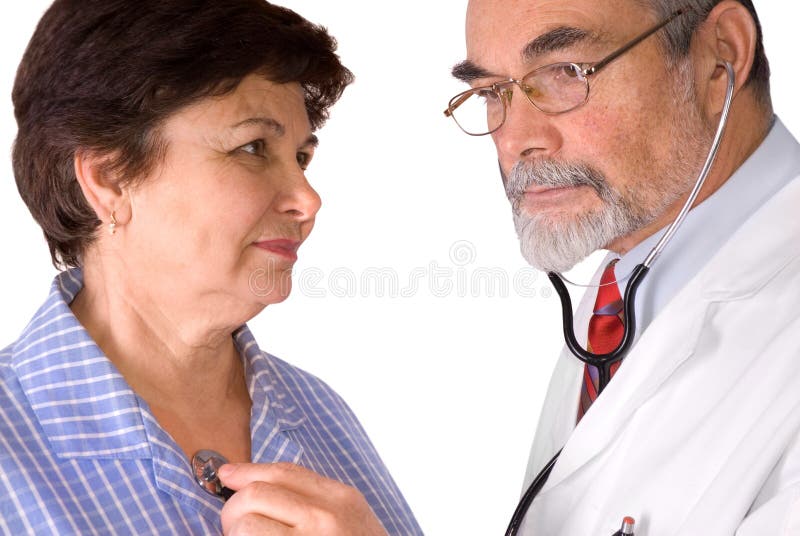 An elderly women being examined by a doctor. An elderly women being examined by a doctor
