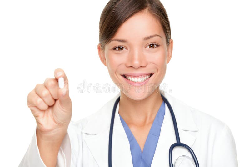 Medico che dà pillole fotografia stock libera da diritti