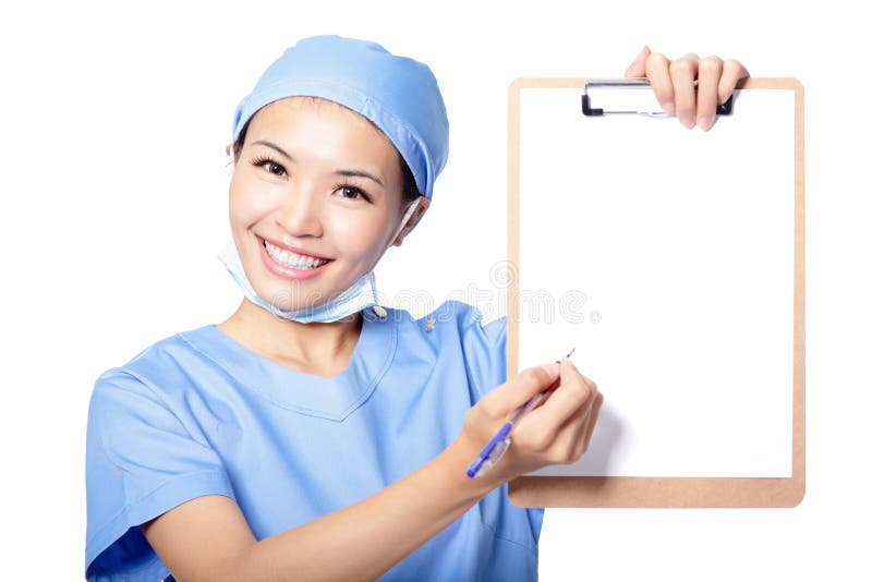 Medico della donna che mostra appunti in bianco vuoti immagine stock Medico della donna che mostra appunti in bianco vuoti immagine stock