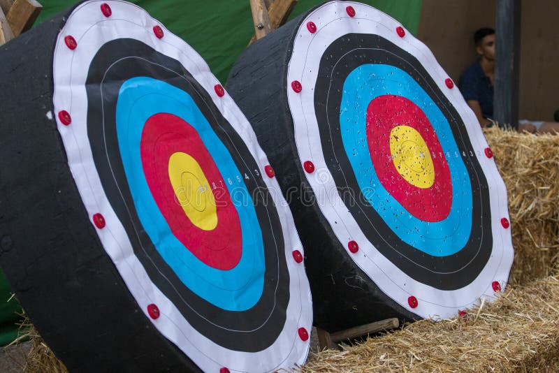 Medieval Archery Target Board in Field with Welsh Flag and Cross