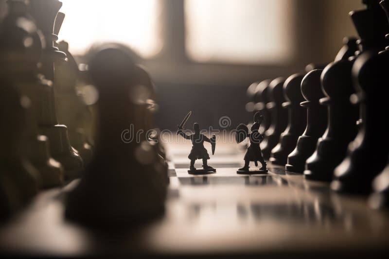 Scenă de luptă medievală cu cavalerie și infanterie pe tablă. conceptul de joc de șah, idei de afaceri și concurență și royalty free stock image