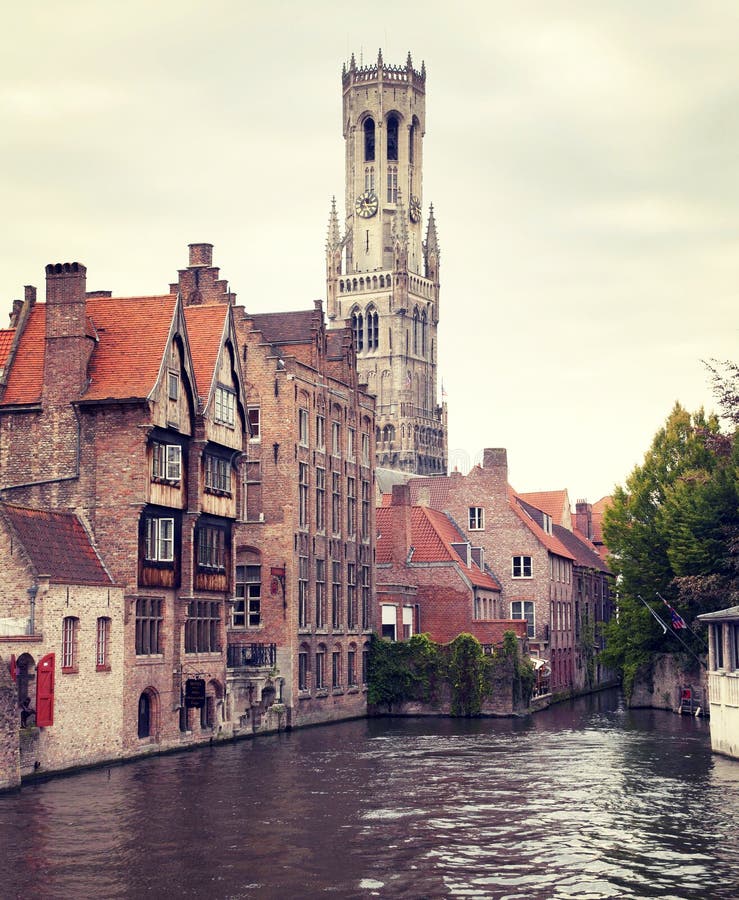 Brugge medieval view of the Belfry tower - the most famous tourist spot in Bruges. Brugge medieval view of the Belfry tower - the most famous tourist spot in Bruges