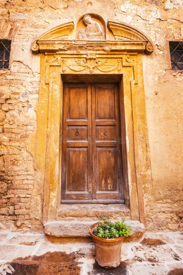 Medieval door details in the historical town of San Gimignano, Tuscany royalty free stock photos Medieval door details in the historical town of San Gimignano, Tuscany royalty free stock photos