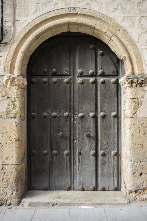 Medieval door Spanish city of Segovia. Old wooden entrance. anci