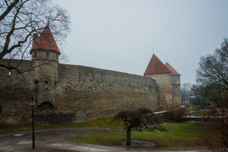Medieval fortress with towers in the Old town. Tallinn, Estonia. The towers have a red tiled roof stock photography Medieval fortress with towers in the Old town. Tallinn, Estonia. The towers have a red tiled roof stock photography