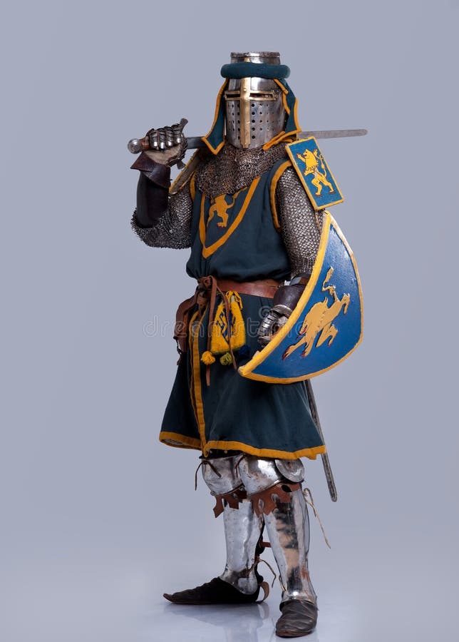 Medieval knight in full armor standing