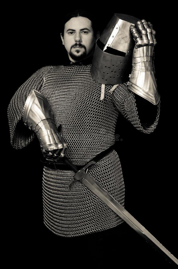 Medieval Knight Holding Helmet and Sword Stock Photo Image of metal