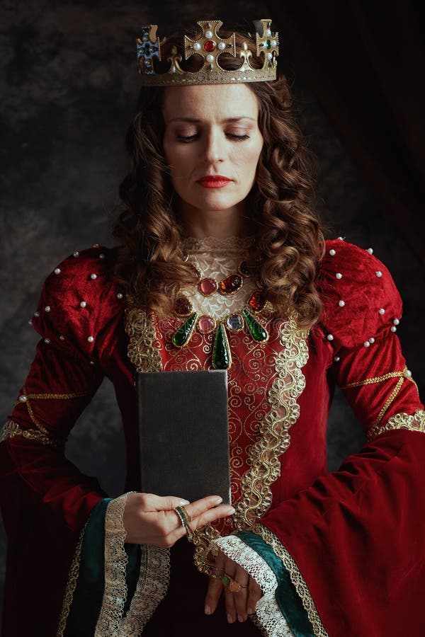 Medieval Queen in Red Dress with Book and Crown Stock Photo - Image of ...