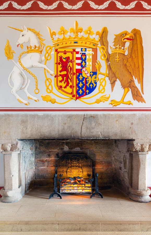 Medieval room of Stirling Castle with hearth and wall decorations