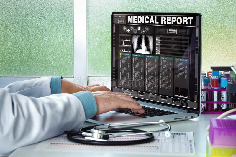 Physician in consultation with a medical record of a patient on the screen of the laptop / Doctor consulting a medical history on a computer. Physician in consultation with a medical record of a patient on the screen of the laptop / Doctor consulting a medical history on a computer