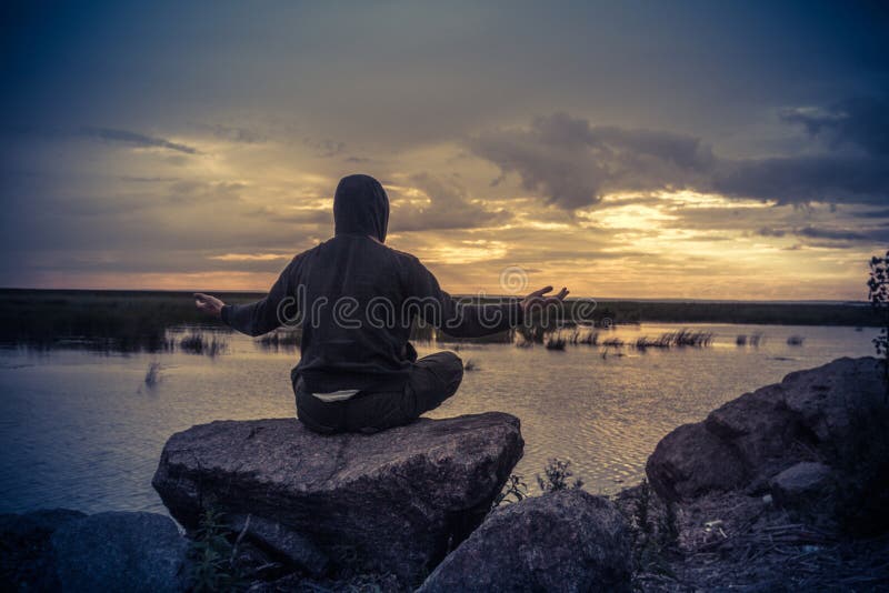Meditation on the background of the Gulf of Finland, Kronshtadt ,Russia stock photo Meditation on the background of the Gulf of Finland, Kronshtadt ,Russia stock photo