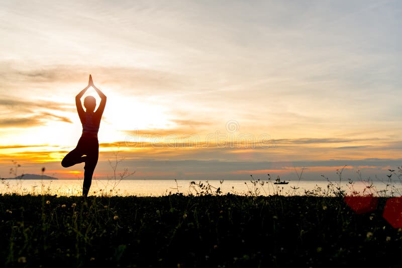 Meditation yoga lifestyle woman silhouette on the Sea sunset, relax vital stock photos Meditation yoga lifestyle woman silhouette on the Sea sunset, relax vital stock photos
