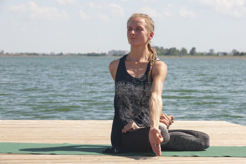 Meditation. young woman sitting in the lotus position royalty free stock photography Meditation. young woman sitting in the lotus position royalty free stock photography