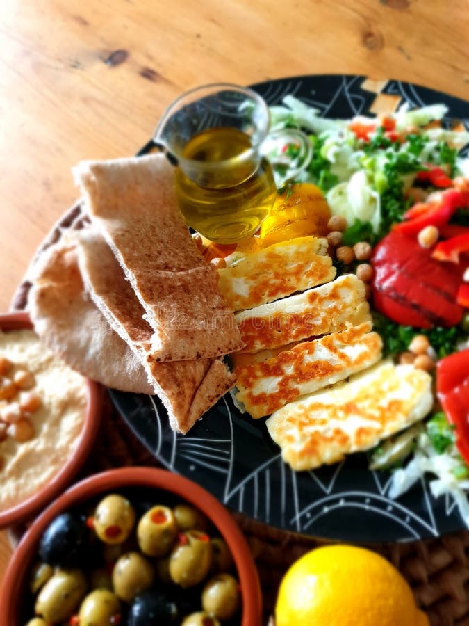 Mediteranean Feast of Grilled Haloumi Cheese, Hummus and Pitta Bread