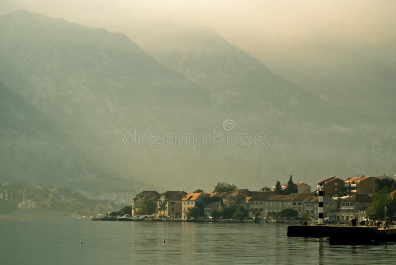 Mediterranean bay village with mountains