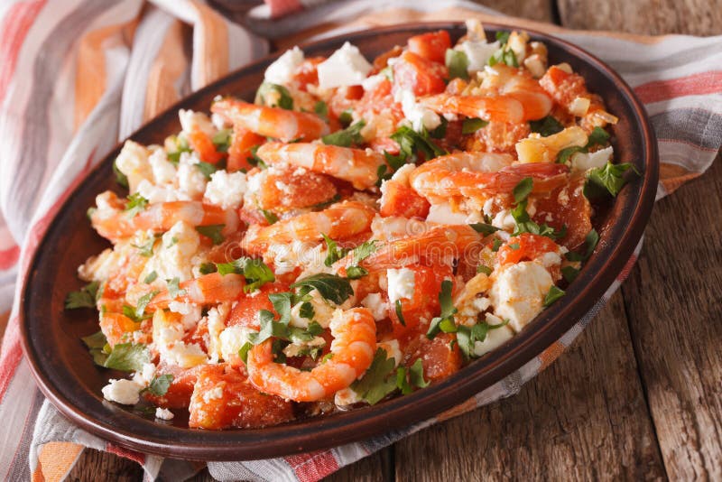 Shrimp Saganaki with Tomato and Feta Cheese on a Plate. Horizontal Top ...