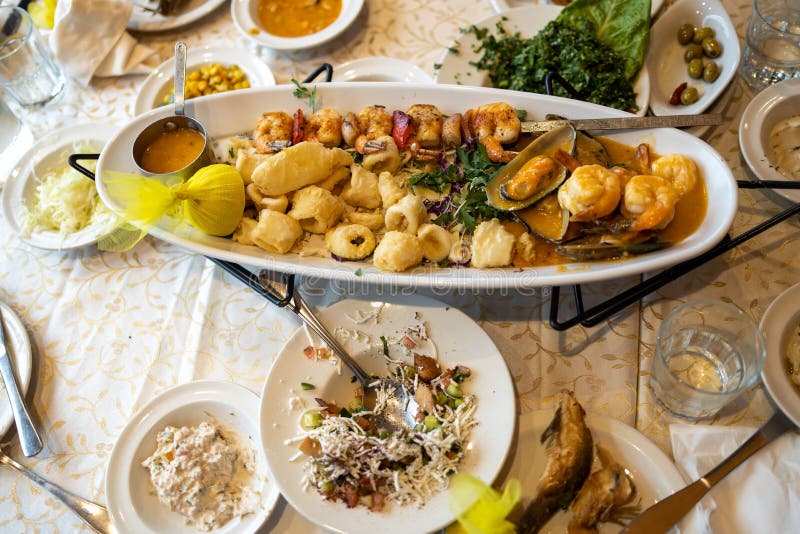 Seafood Dishes on the Table. Serving Stock Image Image of spinach