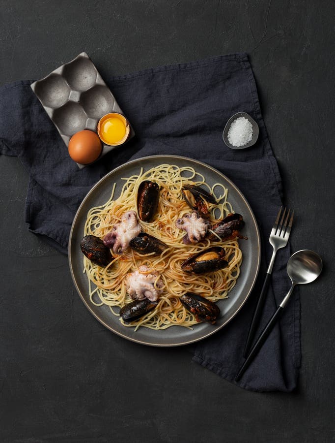 Pasta with seafood on dark background royalty free stock images Pasta with seafood on dark background royalty free stock images