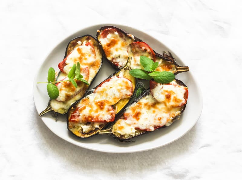 Mediterranean Style Baked Eggplant with Mozzarella and Tomatoes on a