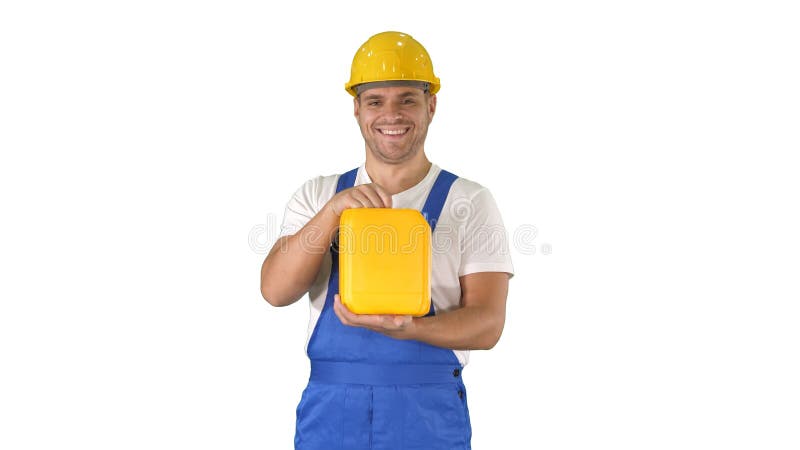 Construction worker advertising construction material in canister on white background. royalty free stock photo