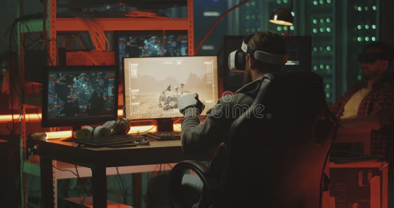 Hackers using VR headset and gloves stock image