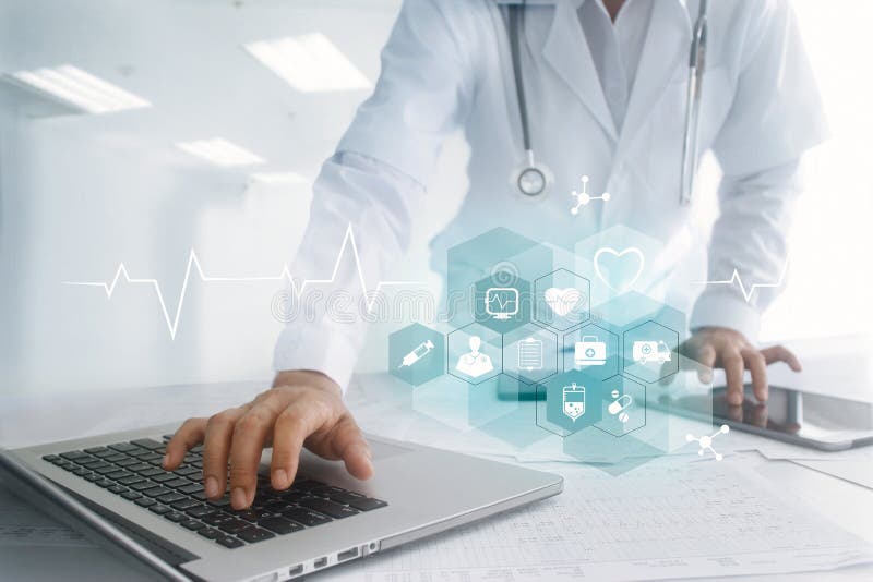 Medicine doctor hand touching laptop and tablet computer interface as medical network connection with modern icon on virtual screen, Digital healthcare, medical technology network and innovation concept. Medicine doctor hand touching laptop and tablet computer interface as medical network connection with modern icon on virtual screen, Digital healthcare, medical technology network and innovation concept